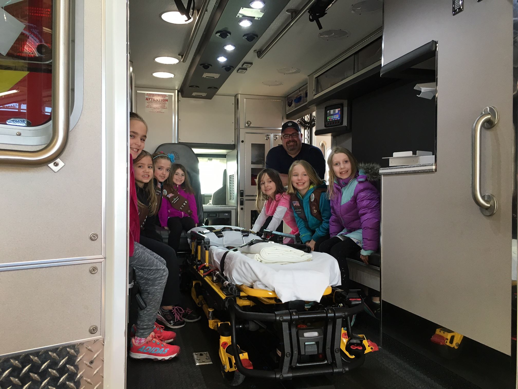 Eric Lang gives a tour to a Girl Scout Troup