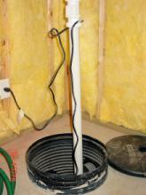 A sump pump system in a residential basement